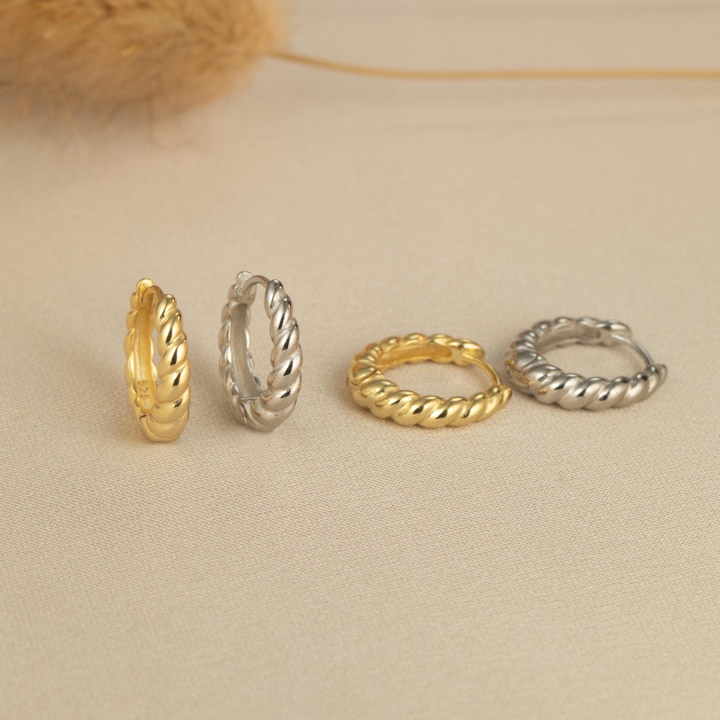 three different types of rings sitting on a table