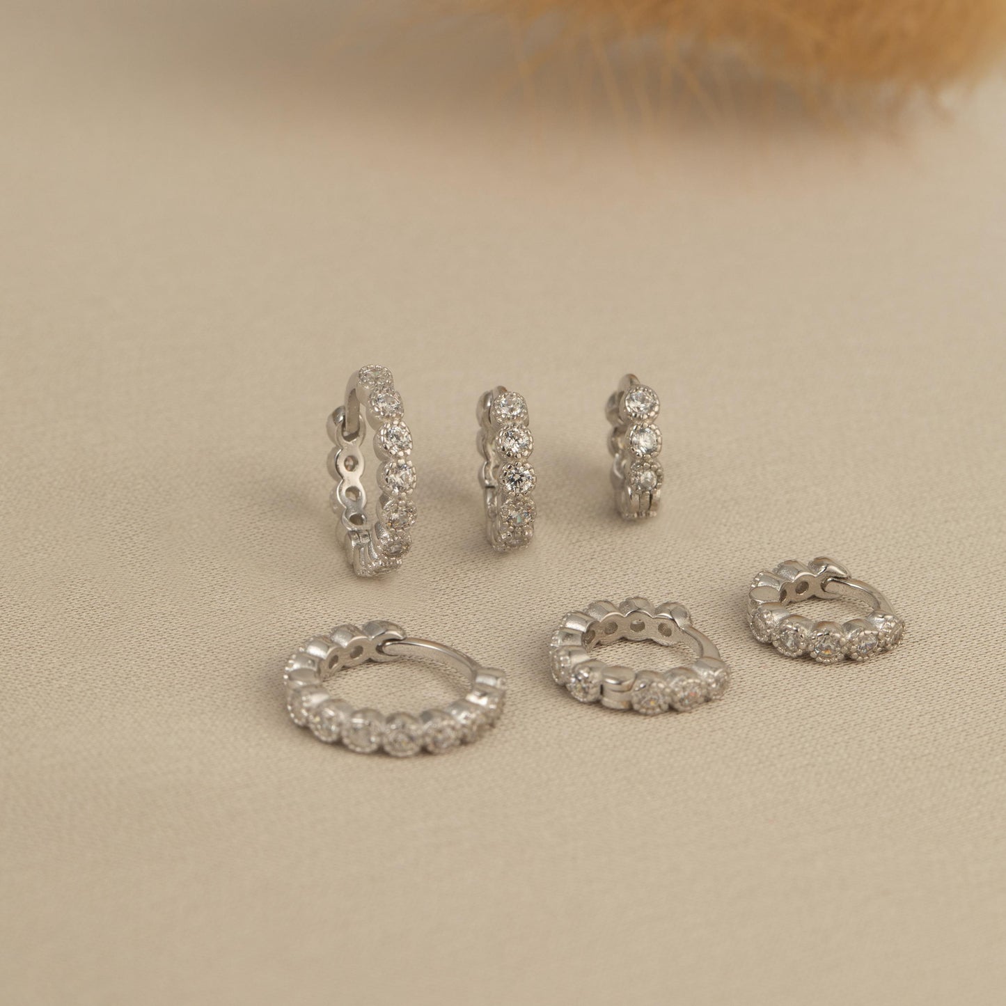 a bunch of different types of rings on a table