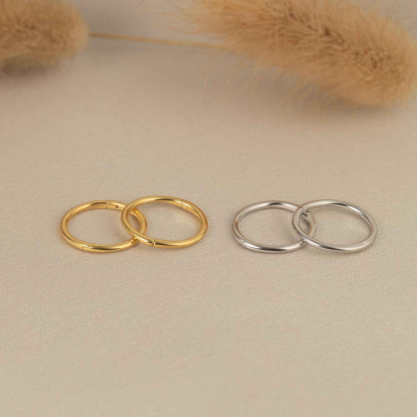 a couple of rings sitting on top of a table
