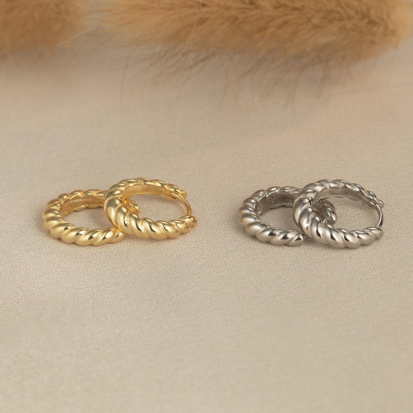 three different types of rings sitting on a table