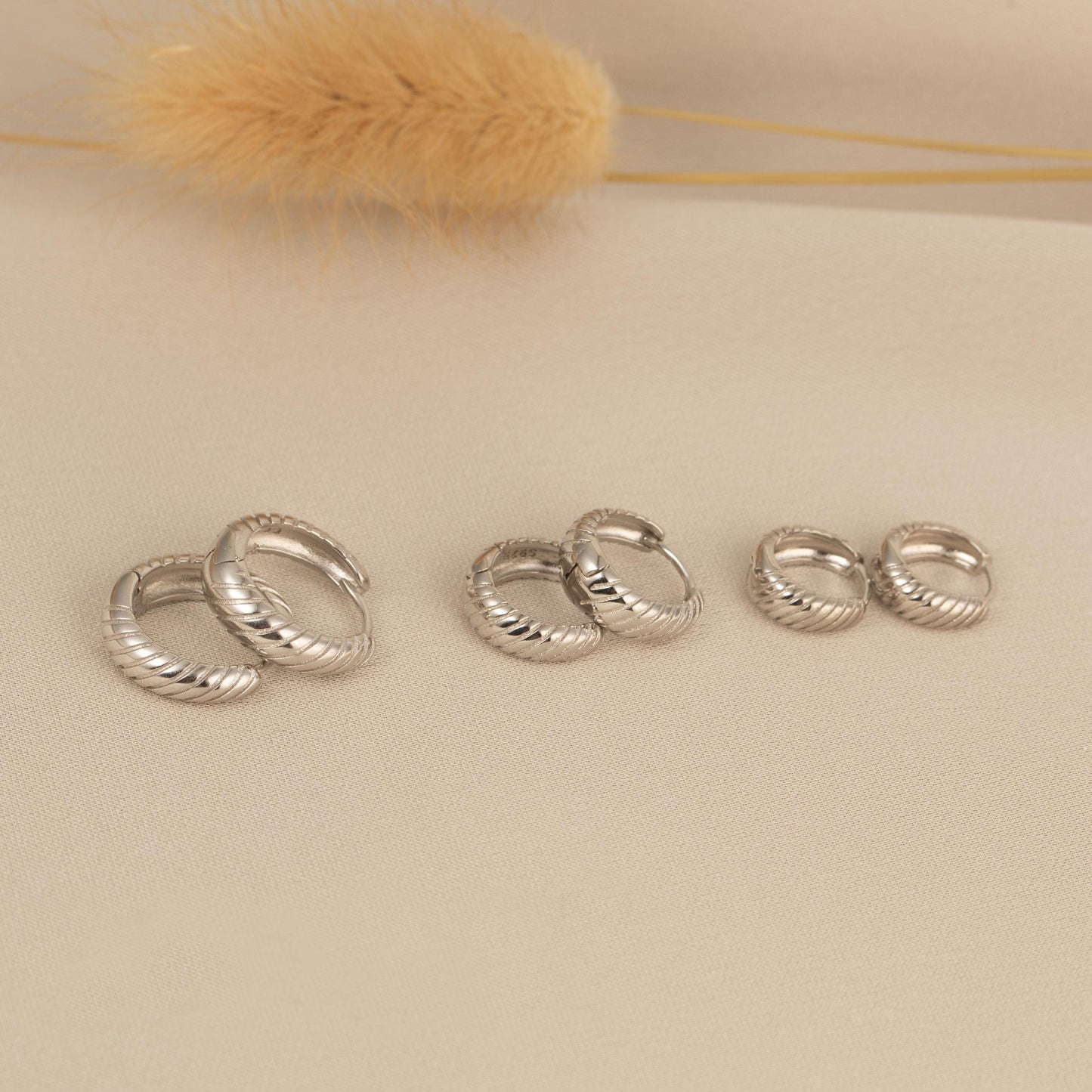 a group of five rings sitting on top of a table