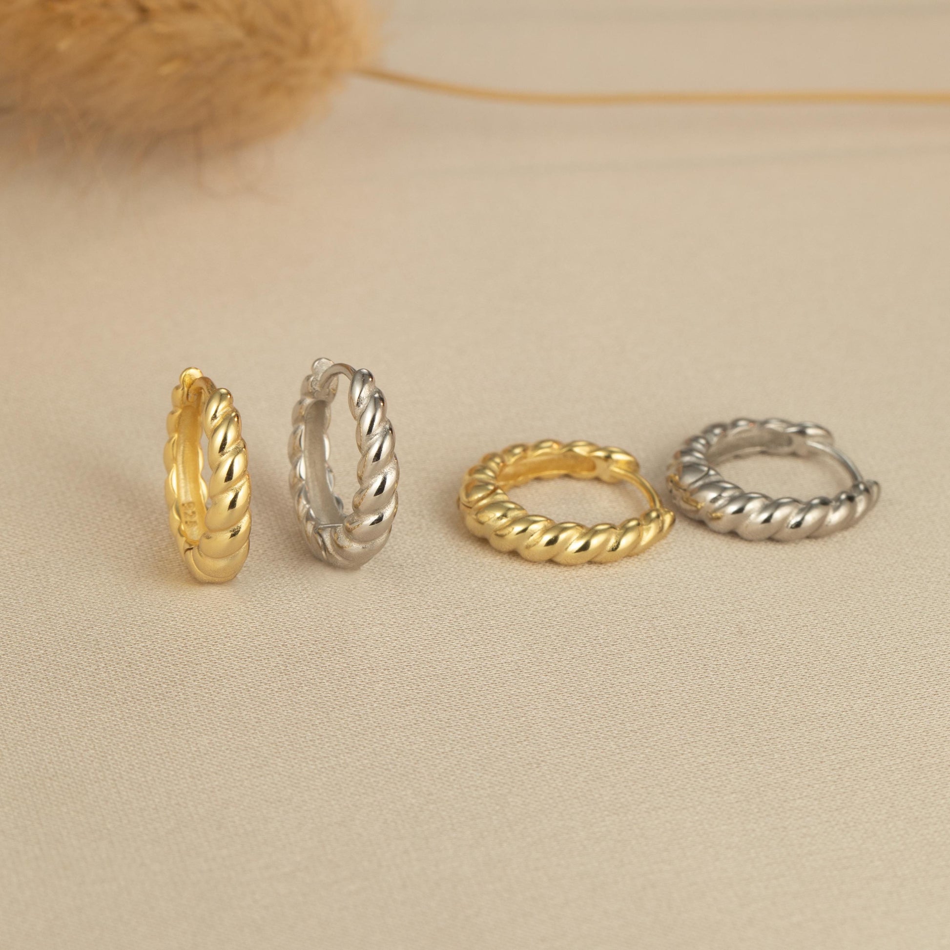 three different types of rings sitting on a table