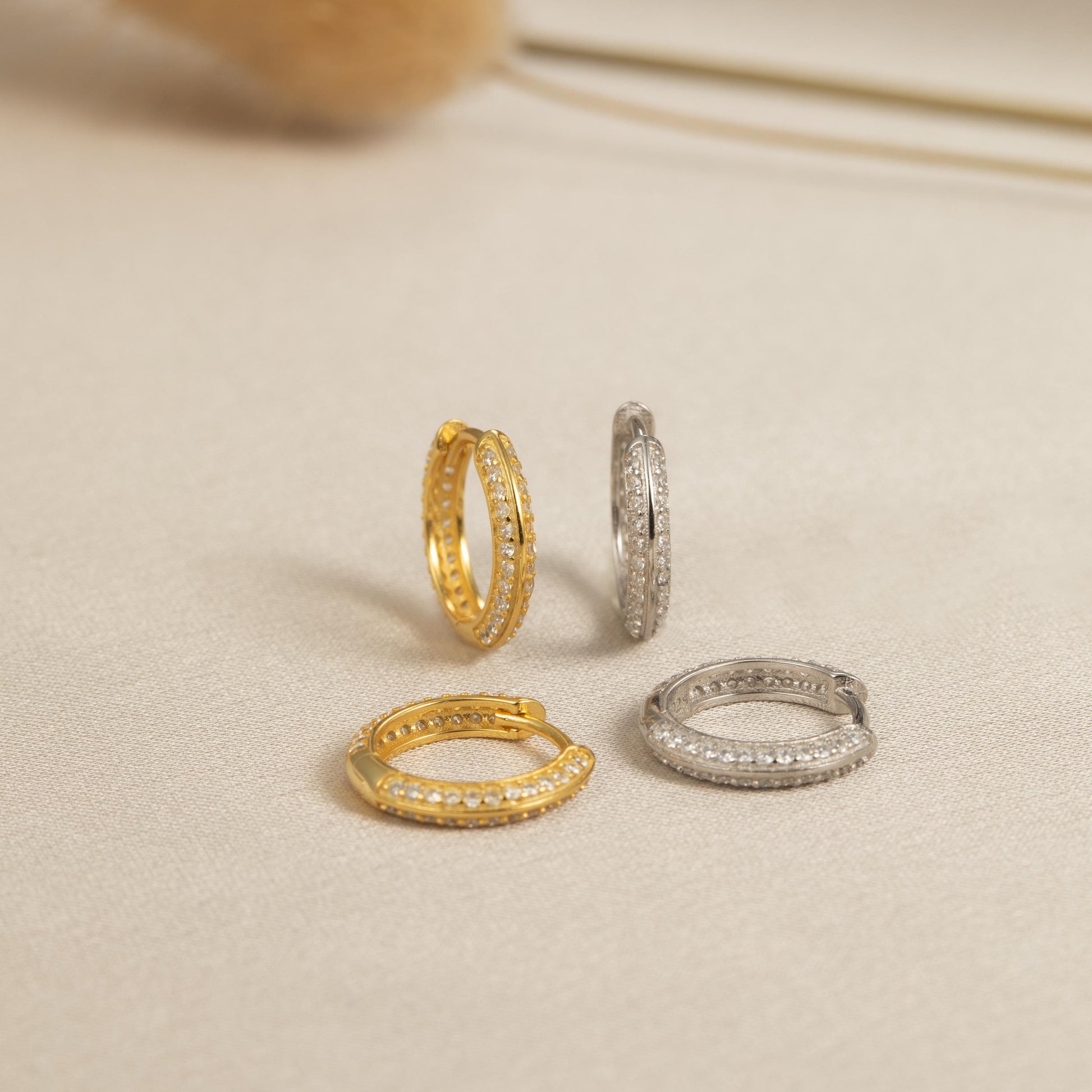 three different types of rings sitting on a table