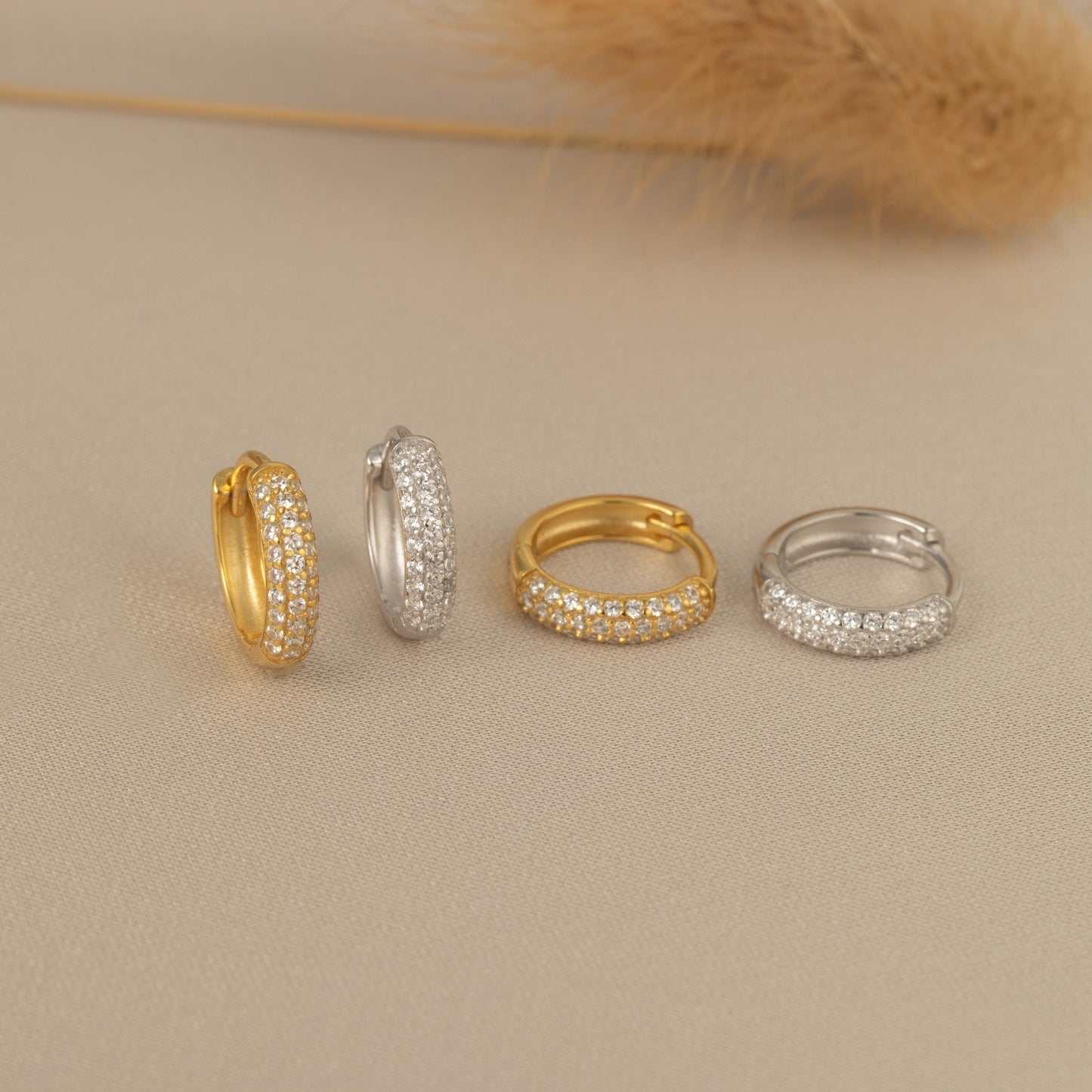 a group of three rings sitting on top of a table