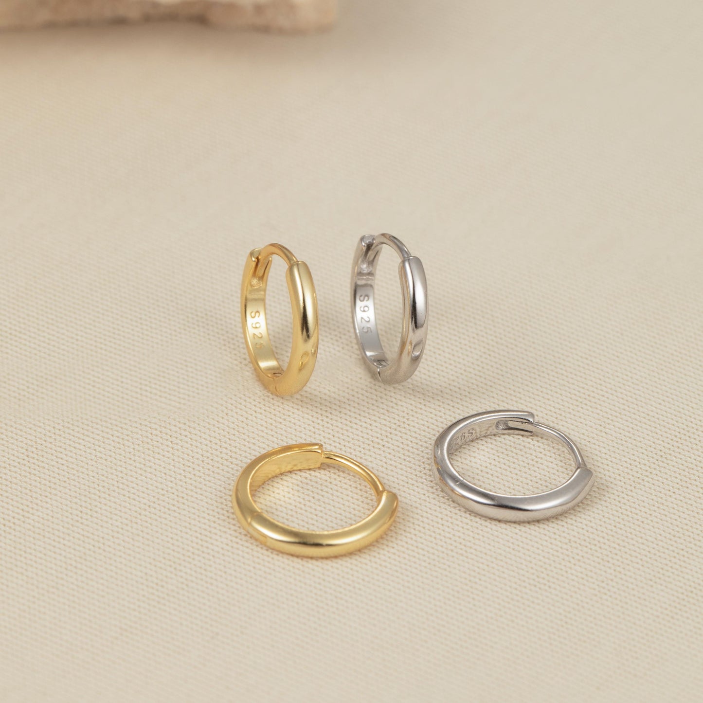 three different types of rings sitting on a table