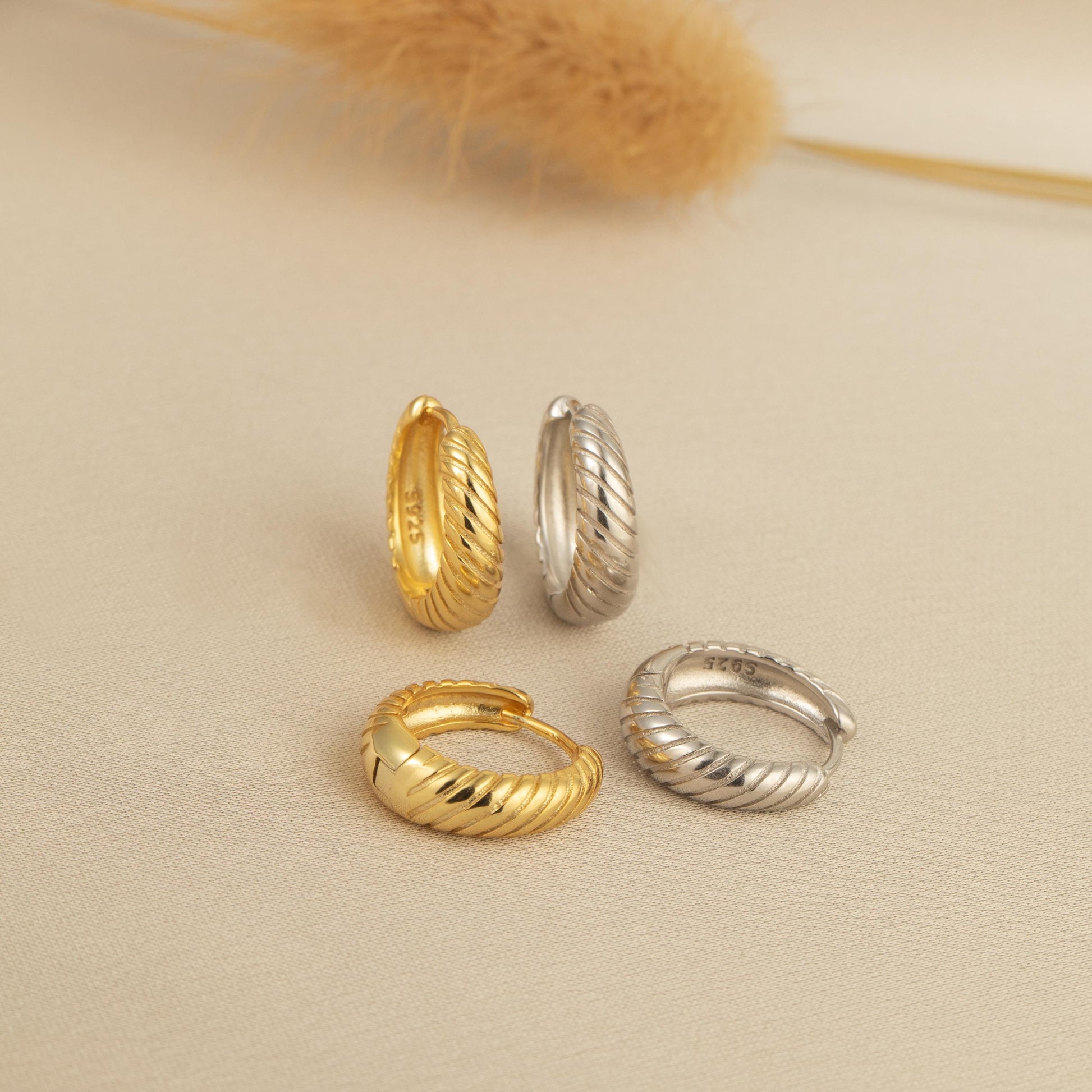 a group of three rings sitting on top of a table