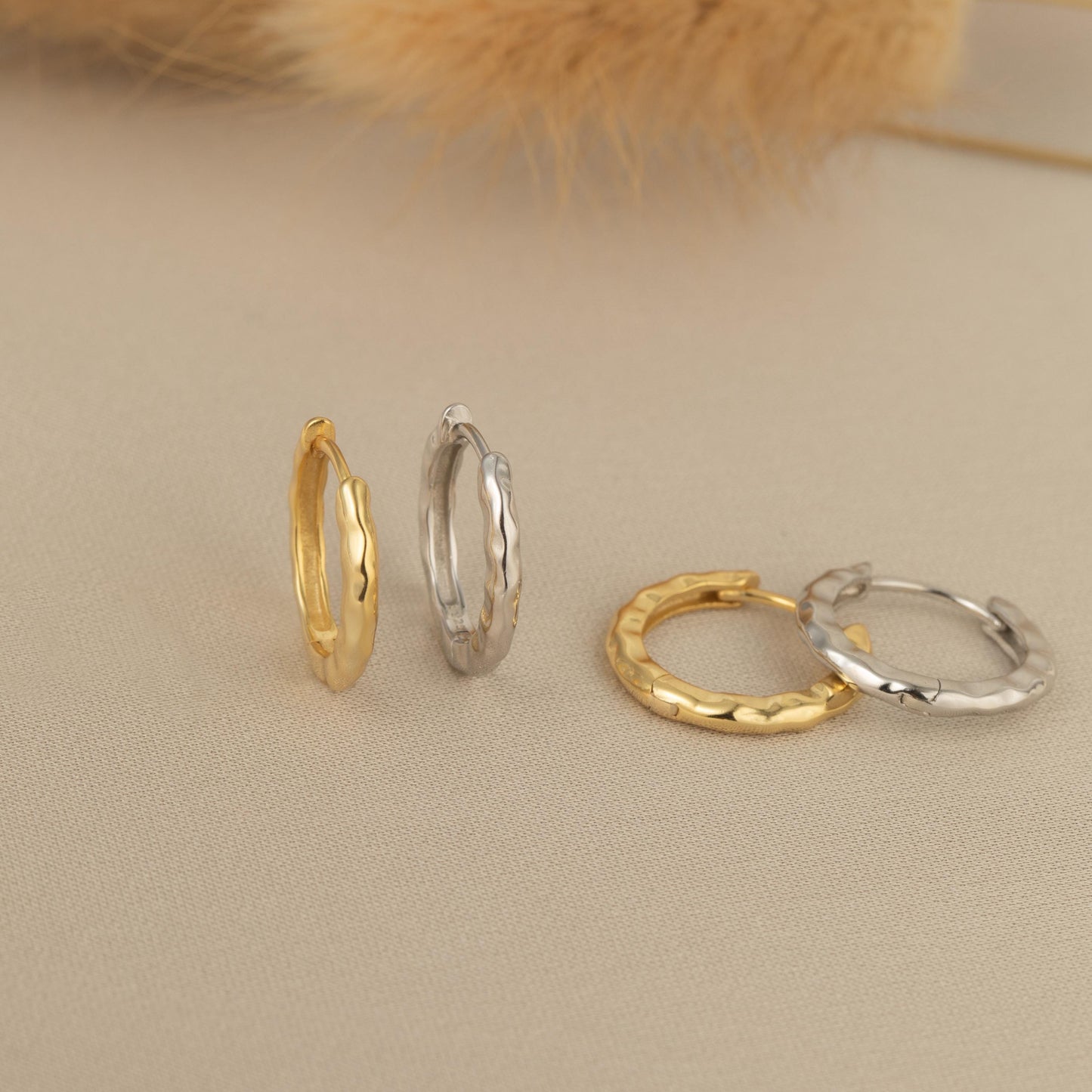 three different types of rings sitting on a table