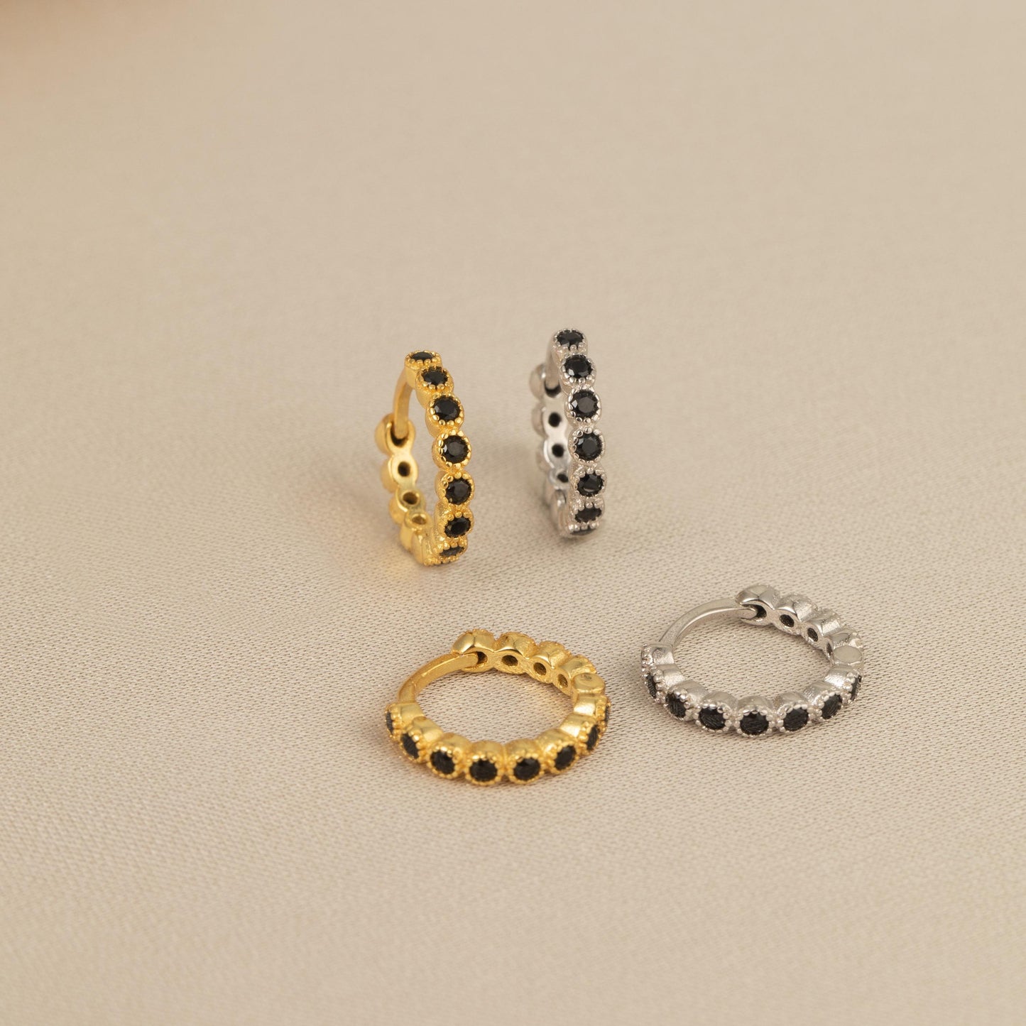 four different types of rings on a table