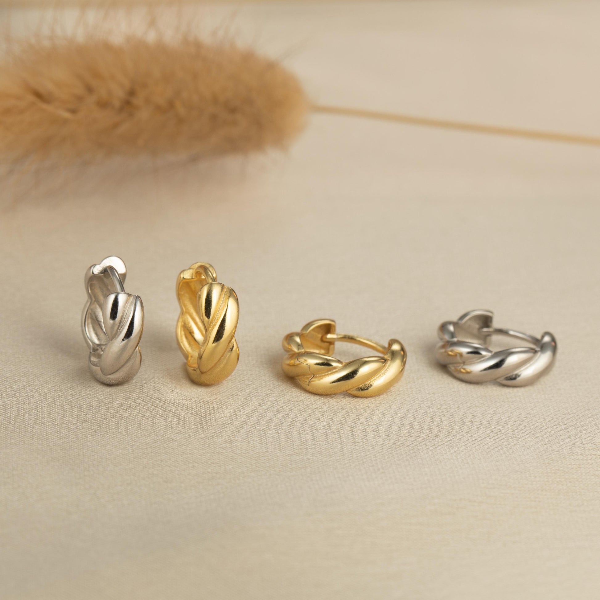 a group of four rings sitting on top of a table