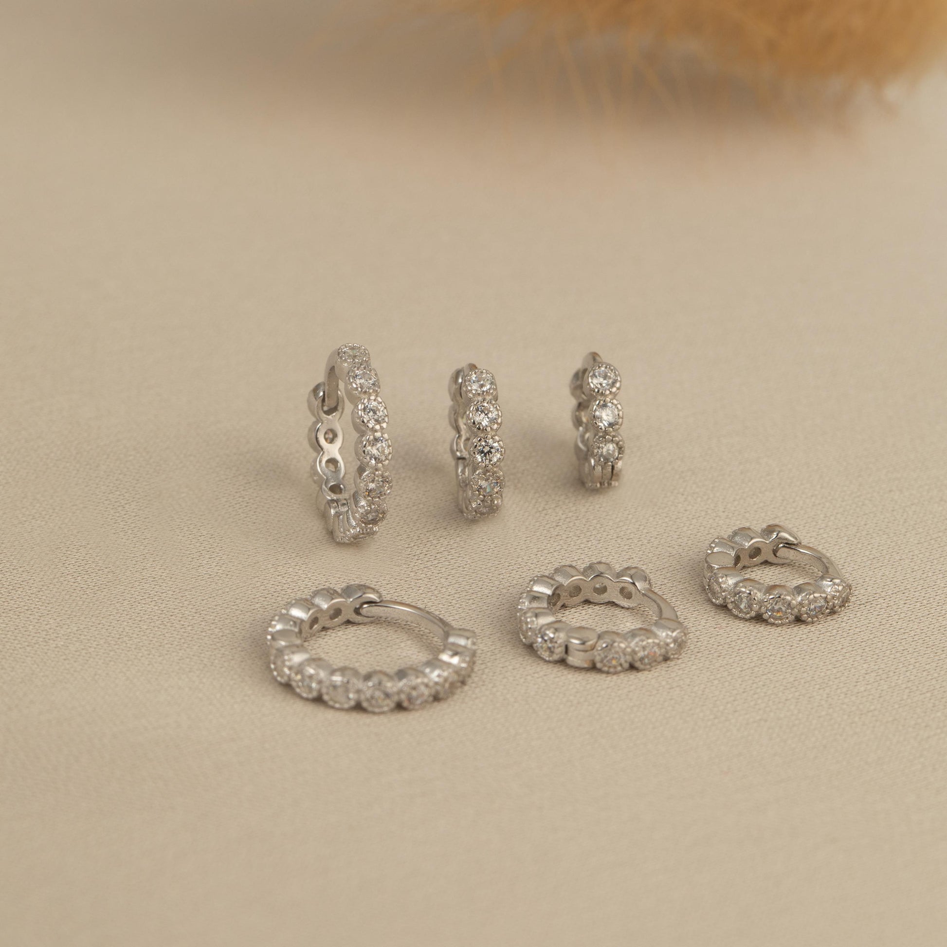 a bunch of different types of rings on a table