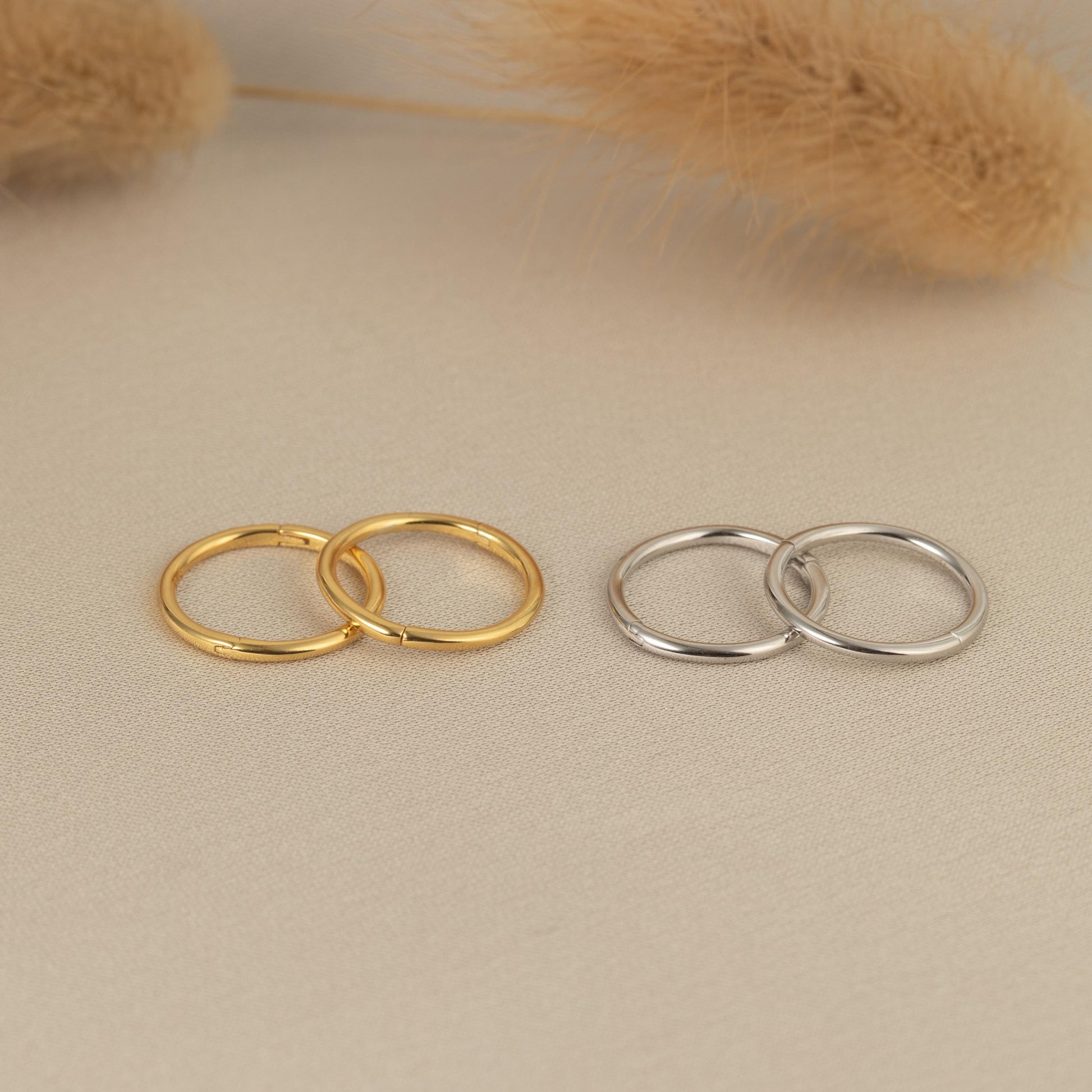a couple of rings sitting on top of a table