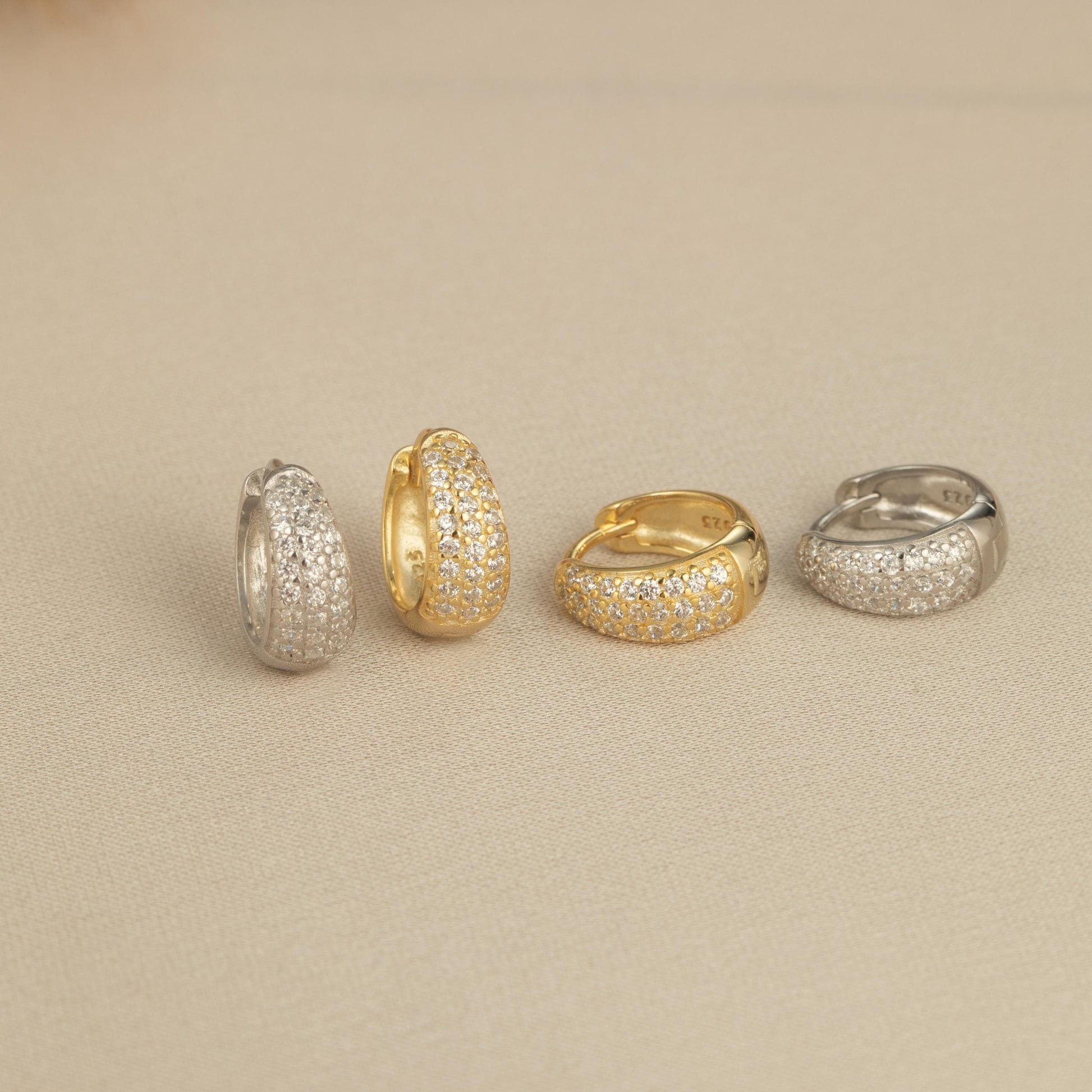 a group of three rings sitting on top of a table