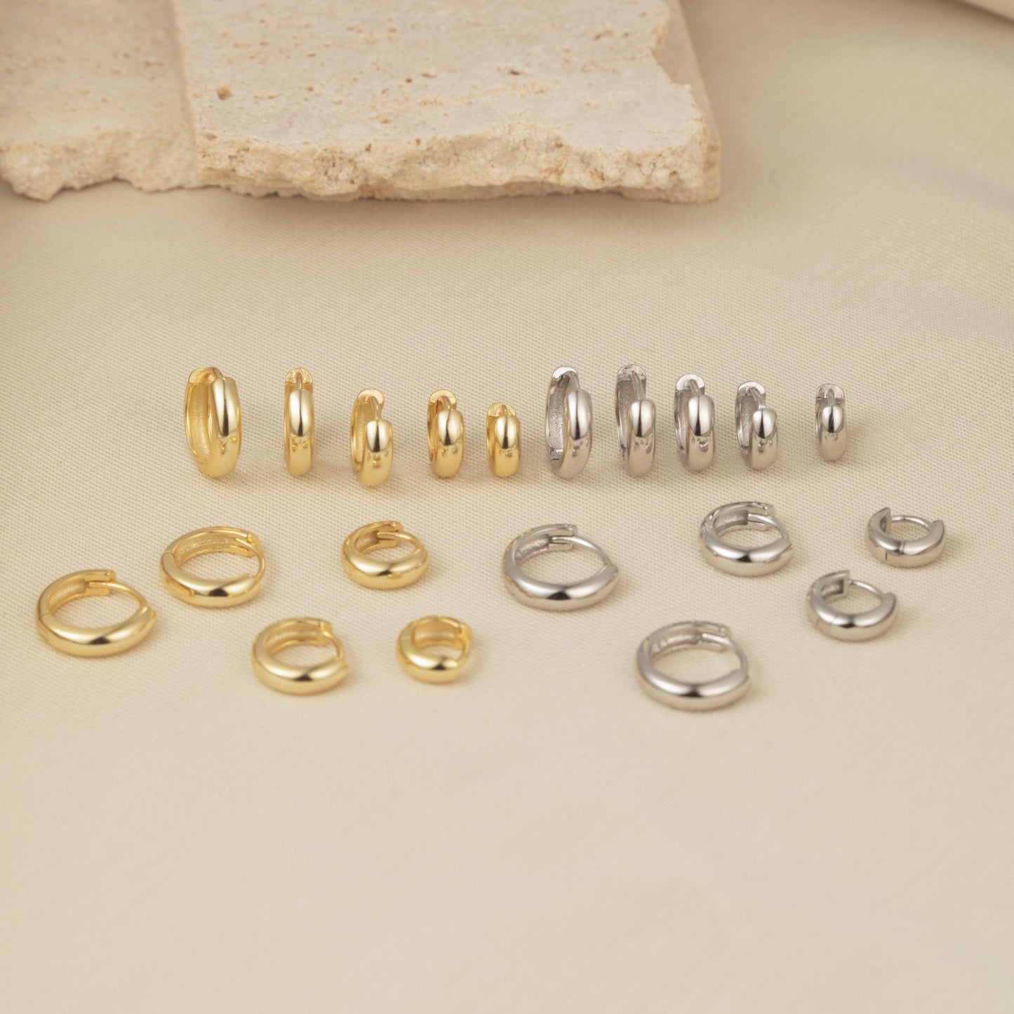 a bunch of different types of rings on a table