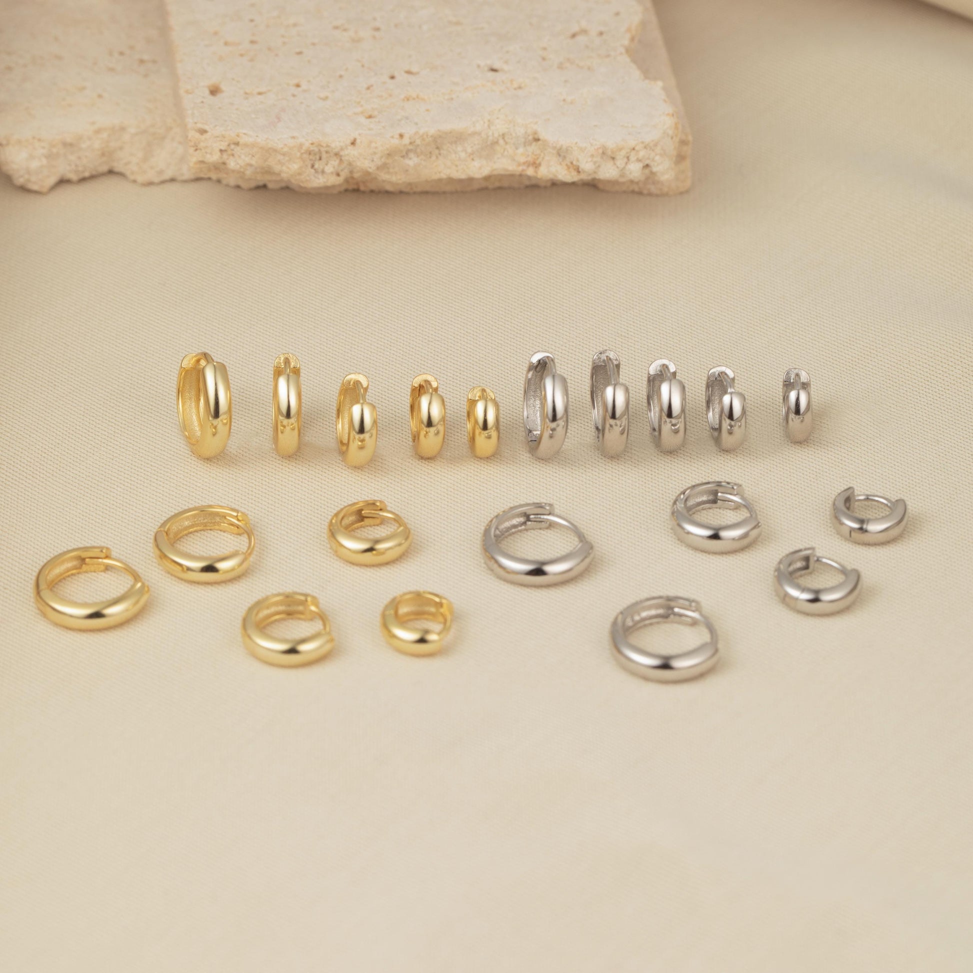 a bunch of different types of rings on a table