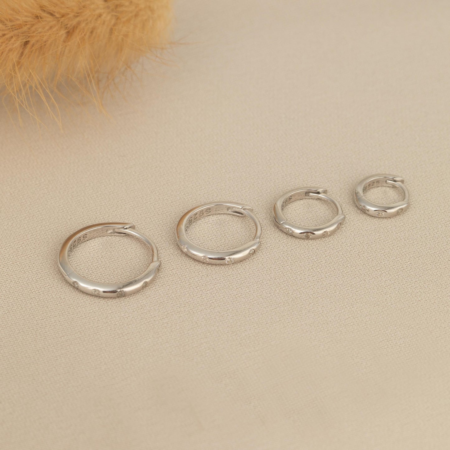a group of five rings sitting on top of a table